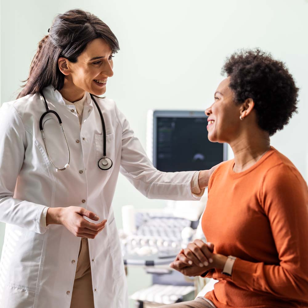 Clinician with patient Clinician with patient
