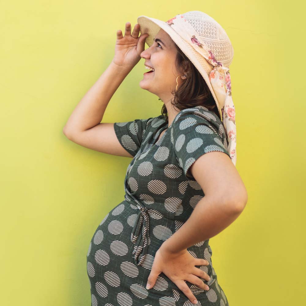Pregnant woman in a sunhat Pregnant woman in a sunhat